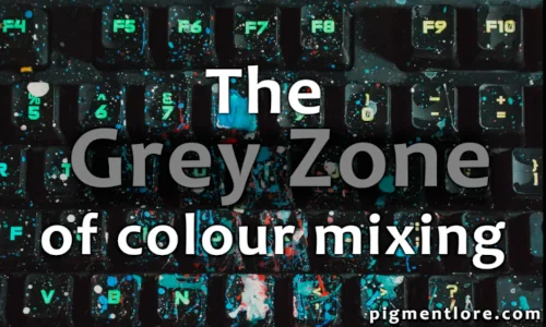 A computer keyboard covered in coloured paint splatters.